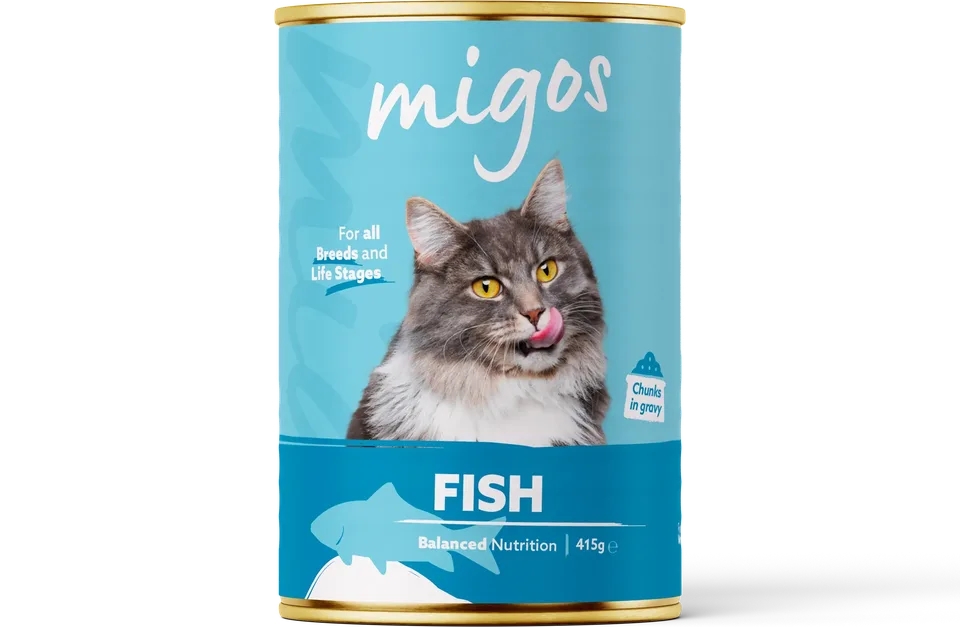 Can of Migos fish wet cat food, 415g, with chunks in gravy, for all breeds and life stages.