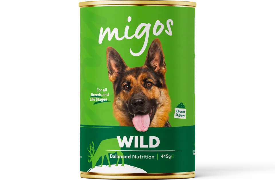 Can of Migos wild wet dog food, 415g, with chunks in gravy, for all breeds and life stages.